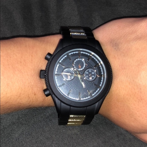 Gold and black Men’s Watch